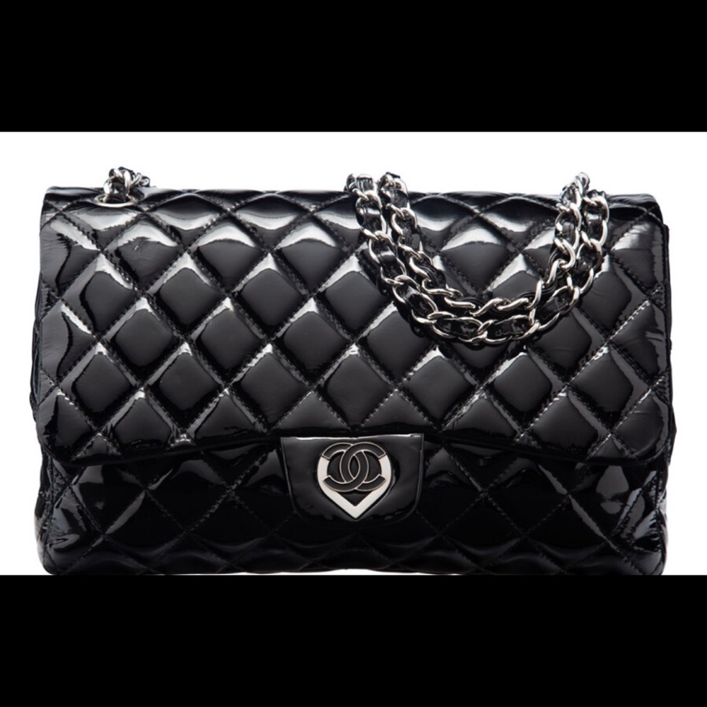 Chanel Black Quilted Patent Leather Heart Flap Bag with Silver Hardware.